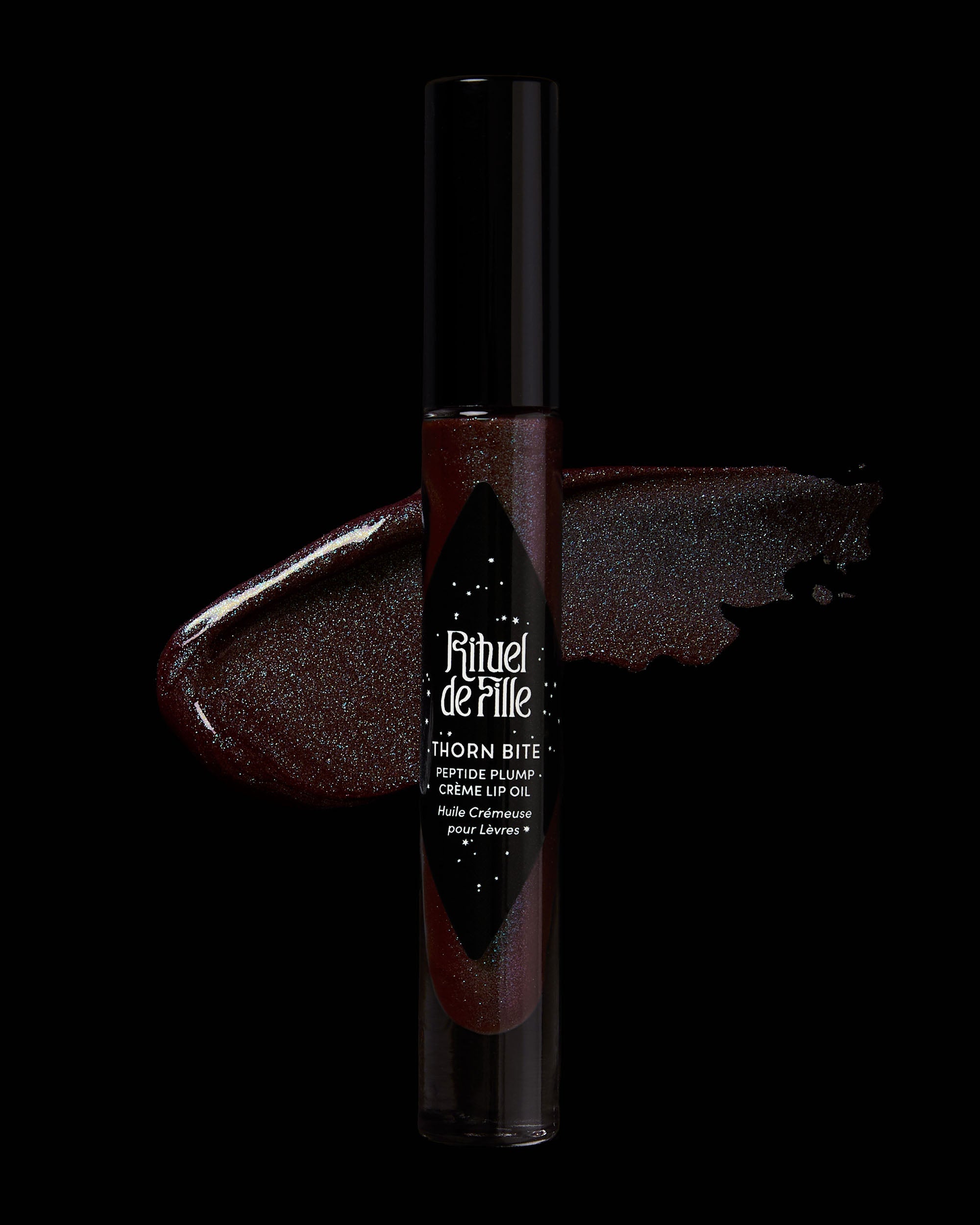 Lip gloss with brand name on a black background